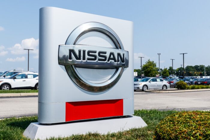 Logo and Signage of a Nissan Car 