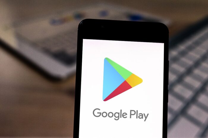 Google Play logo on a mobile device.