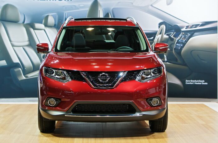 Red Nissan Rogue on display