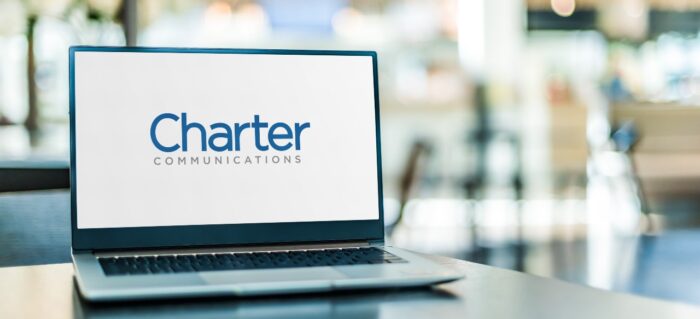 Laptop computer displaying logo of Charter Communications