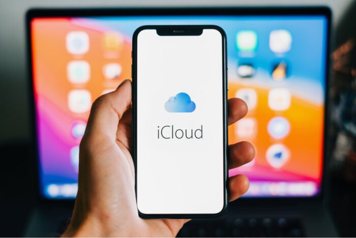 iPhone with apple iCloud logo on the screen.