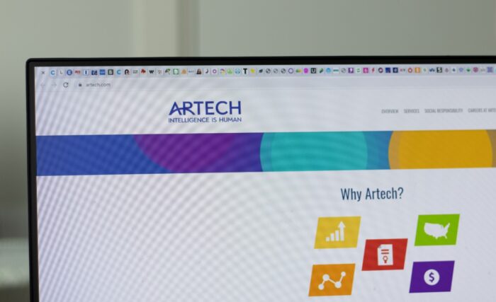 Artech company website on screen - artech lawsuit - artech data breach