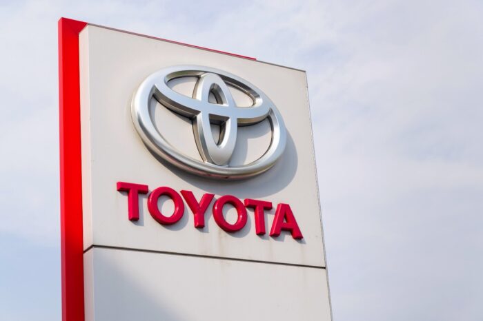 Toyota motor corporation logo on dealership building