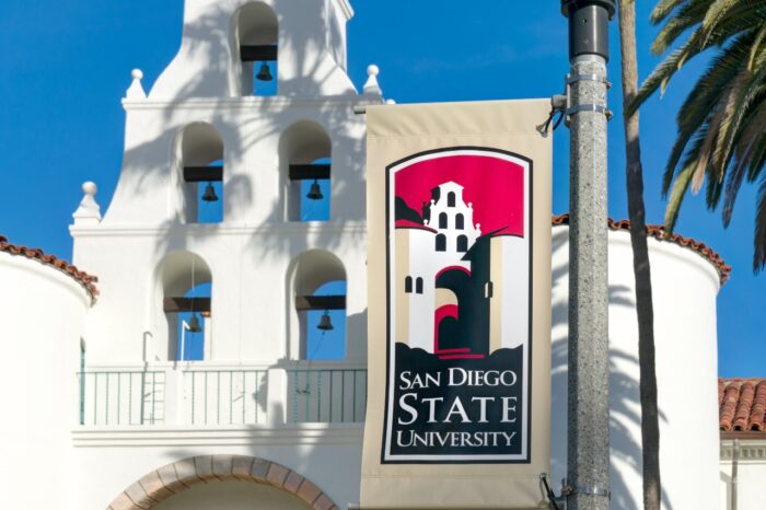 Banner and logo on the campus of San Diego State University. SDSU, San Diego State is a public research university.