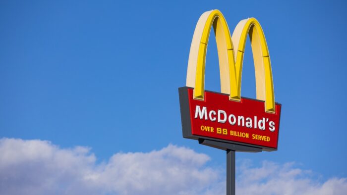 Giant McDonald’s sign, advertising “over 99 billion served.”