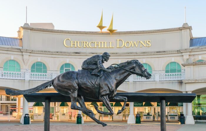 Entrance to Churchill Downs featuring a statue of 2006 Kentucky Derby Champion Barbaro.