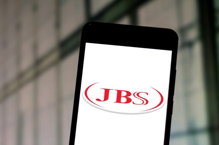 JBS logo is displayed on a smartphone.