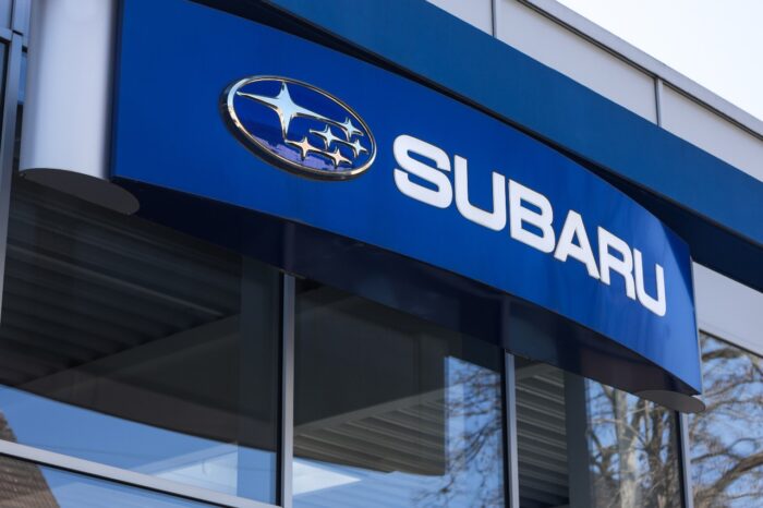 A Subaru car sign on a building