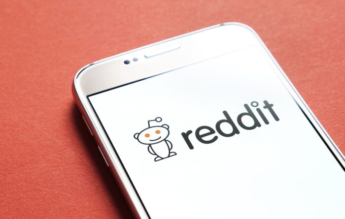 Reddit logo on smartphone screen.
