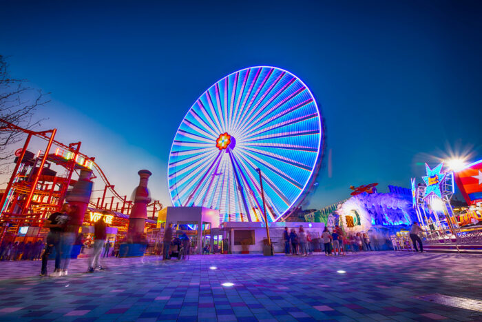 Photo of a Ferris wheel at a theme park.