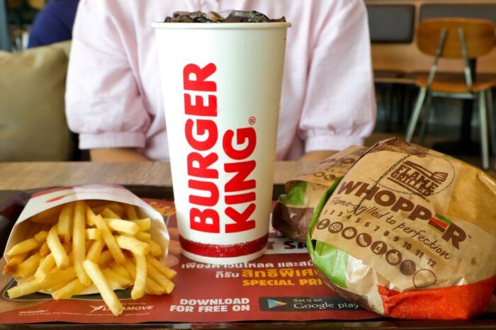 Burger king meal has whopper hamburger french fries and cola drink