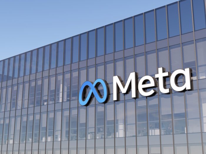 Meta Signage Logo on Top of Glass Building.