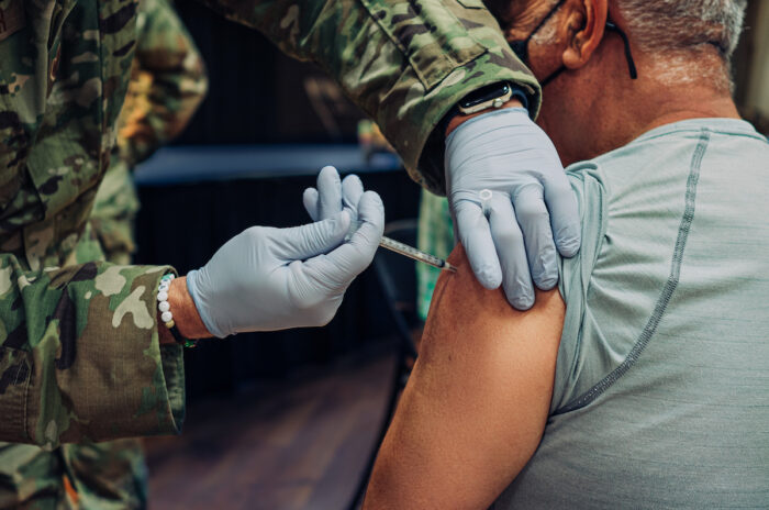 Moderna Vaccine Injection for COVID19 by Air Force soldier.