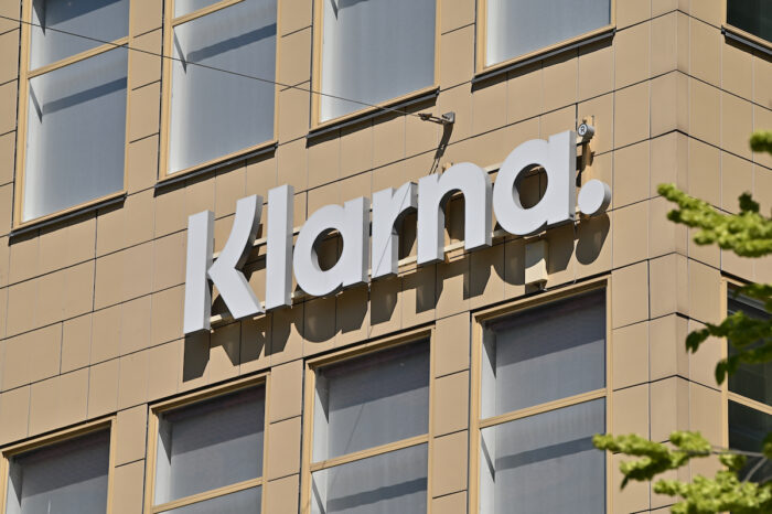 A wall sign for the Swedish payment solutions and credit company Klarna at the corporate headquarters in Stockholm, Sweden.