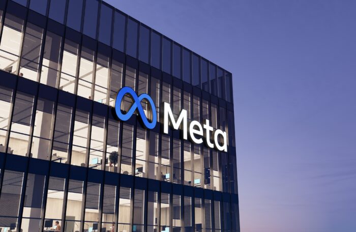 Meta Signage Logo on Top of Glass Building.