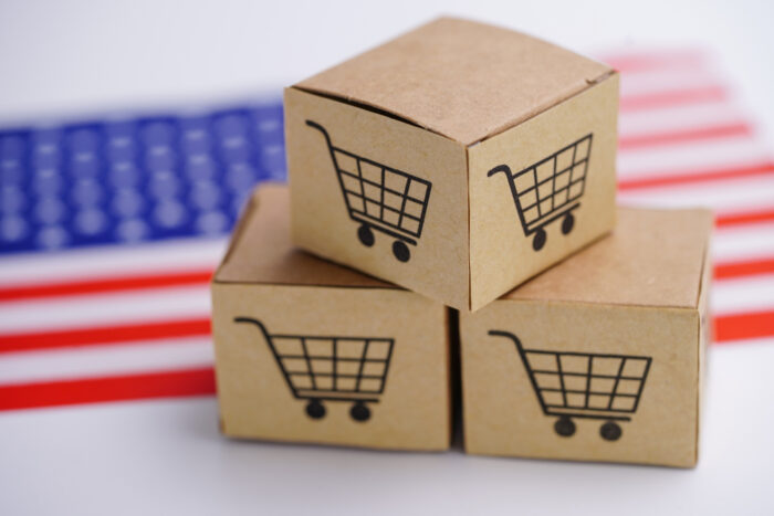 Box with shopping cart logo and The United States of America USA flag.