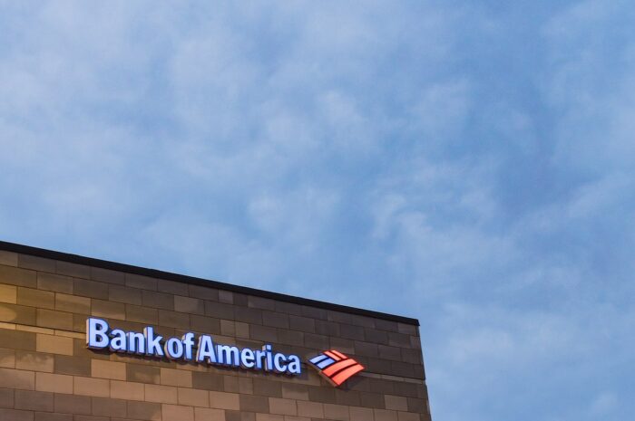 Close up of Bank of America signage against a blue sky - class action, zelle, fraud