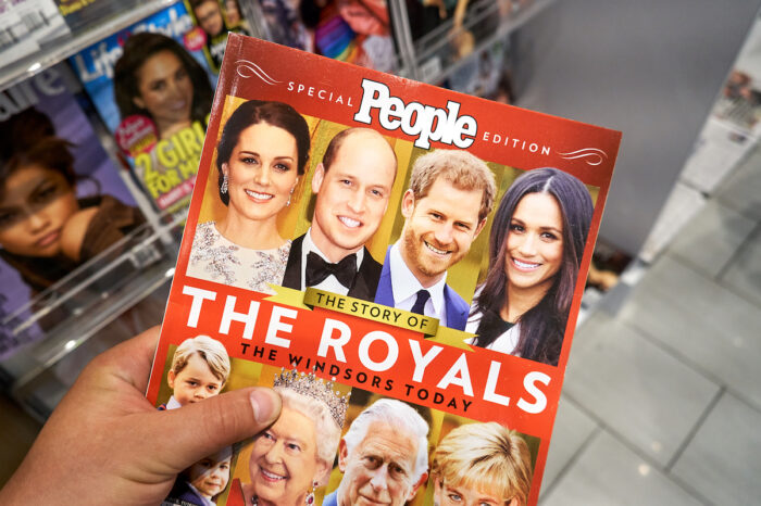 People magazine special edition in a hand.