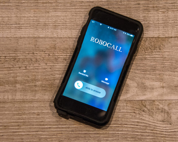 Close up of cell phone receiving a call from 'Robocall' - attorneys general -robocalls - fcc