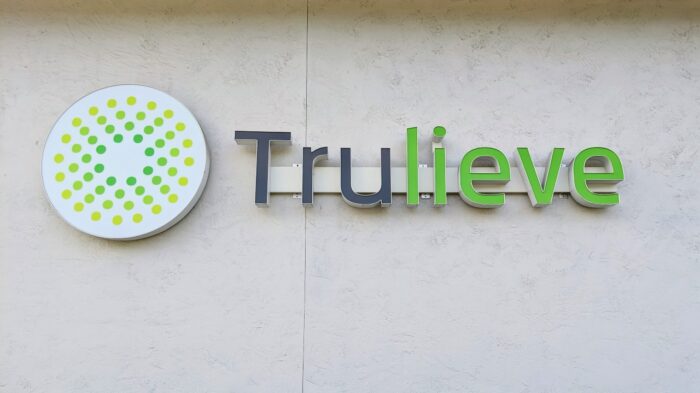 Florida licensed medical marijuana cannabis provider Trulieve name, logo and trademark posted on side of building - trulieve class action lawsuit