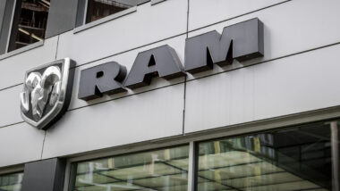 A close-up of the Ram Truck logo sign taken at a local car dealership selling car, trucks and vans.