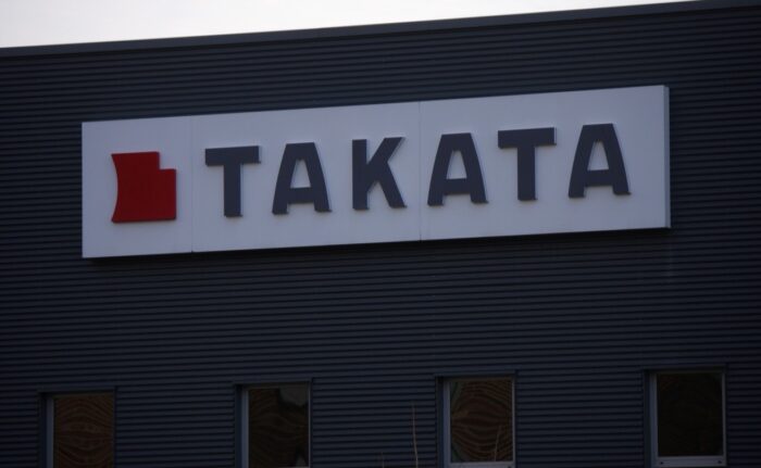 Takata sign on building - TK Holdings safety systems settlement