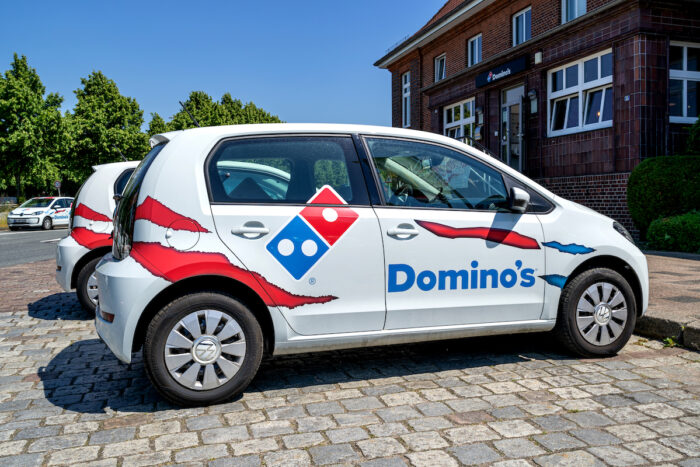 Delivery cars at Domino's restaurant.