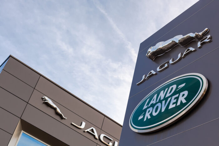 Exterior of Jaguar Land Rover signage on a building.
