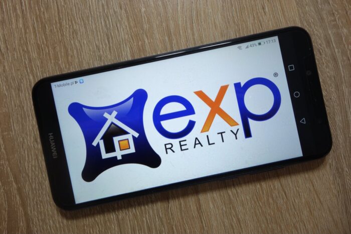 eXp Realty logo displayed on smartphone