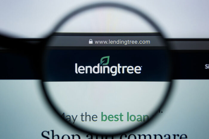 A magnifying glass shows the LendingTree logo on the company's homepage, representing the LendingTree data breach class action.