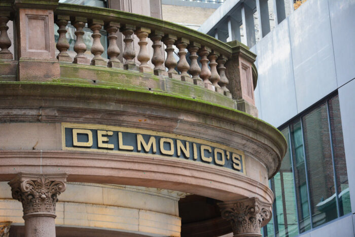 Sign above Delmonico’s Italian Steakhouse - disabililty lawsuit, ada, inaccessible to blind