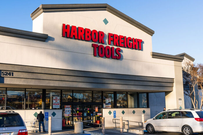 Exterior of a Harbor Freight Tools store against a blue sky - privacy, class action, unsolicited text messages