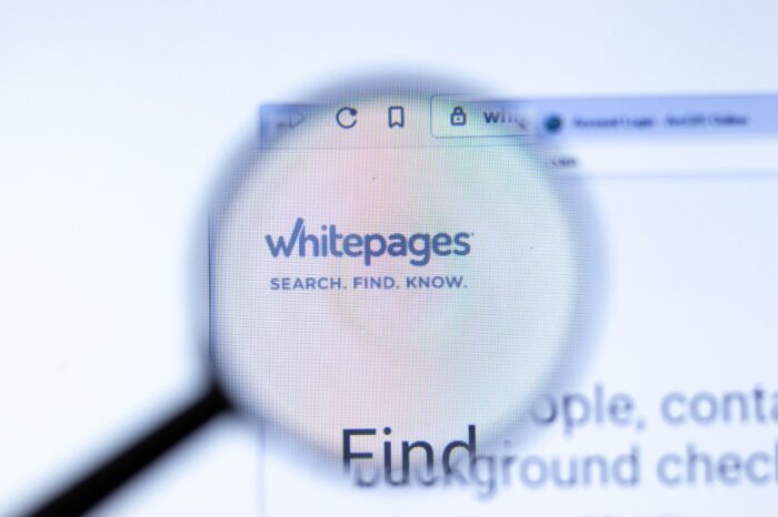 Whitepages whitepages.com company website with logo close up - Whitepages.com settlement, lawsuit, class action lawsuit illinois