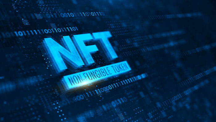 NFT nonfungible tokens concept on dark blue background.
