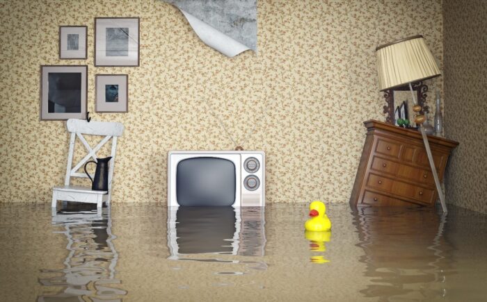 Water rises in a flooded home interior - Erie Insurance Co. settlement, class action lawsuit, nonmaterial depreciation