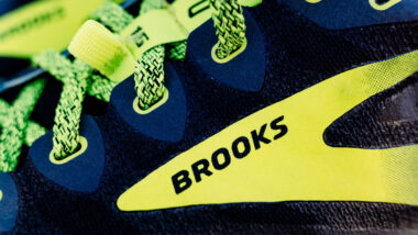 Brooks logo on one of their sport trail running shoes.