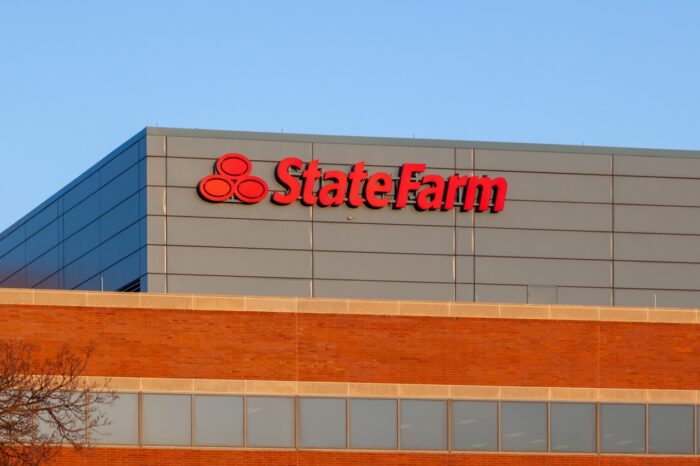 State Farm sign on a building - state farm settlement, state farm class action lawsuit