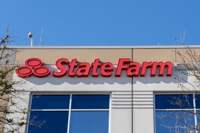 A State Farm sign on its office in Dallas, Texas, USA - state farm racial discrimination class action