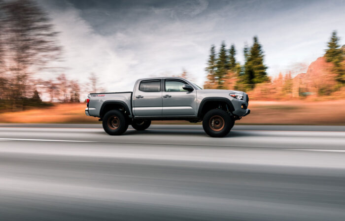 2022 Toyota Tacoma driving on the highway by itself.