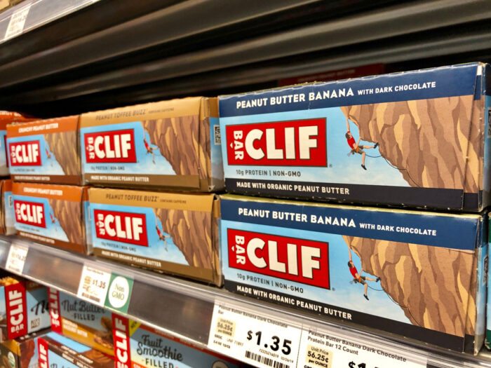 Close up of CLIF protein bars on a store shelf at Whole Foods.