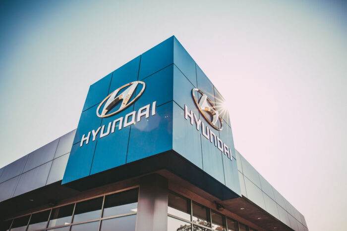 Close up of Hyundai signage on exterior of building.