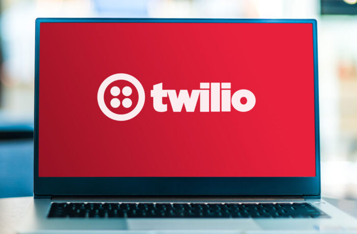 Laptop computer displaying logo of Twilio.