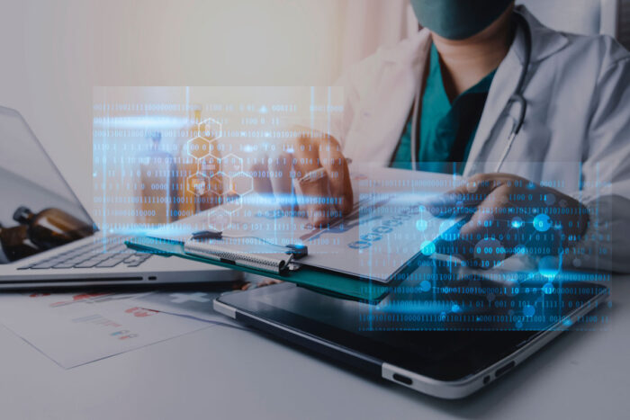Medicine doctor touching on tablet and digital healthcare and network connection with modern virtual screen interface icons on the hospital background.