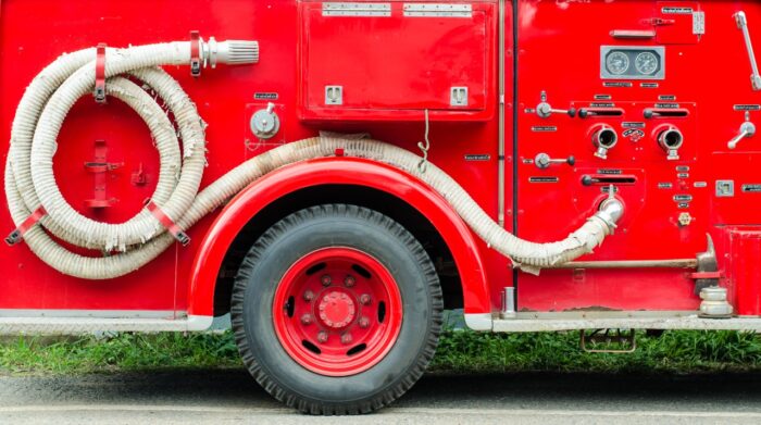Firefighters truck park beside the road - ocala fire fee refund, fire fees, common fund