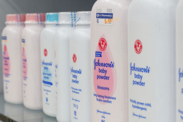 Photos of Johnsons baby powders on a supermarket shelf.