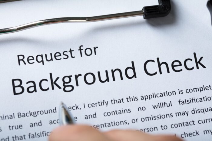 High Angel View Of Background Check Application Form With Pen