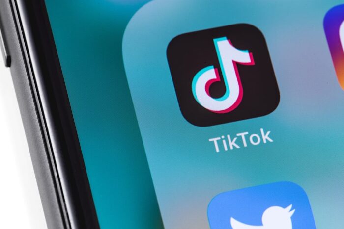 Close up TikTok app icon displayed on a smart phone screen.
