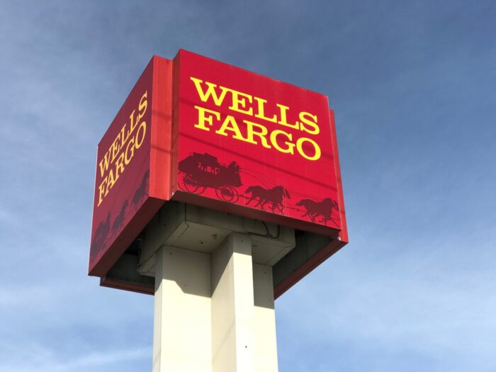 Giant Wells Fargo sign with a blue sky.