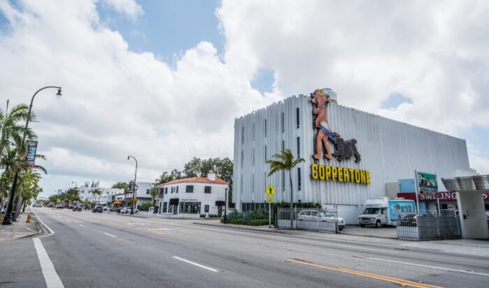 Coppertone vintage advertisement sign on the building in Miami Design District, Coppertone sunscreen benzene settlement