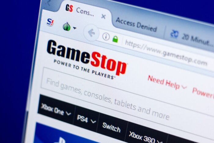 Homepage of GameStop website on the display of PC, url - GameStop.com.